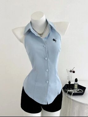Light Blue Sleeveless Button-Down Top